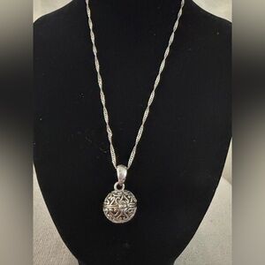 Silver-Toned Filigree Sphere Pendant Necklace.